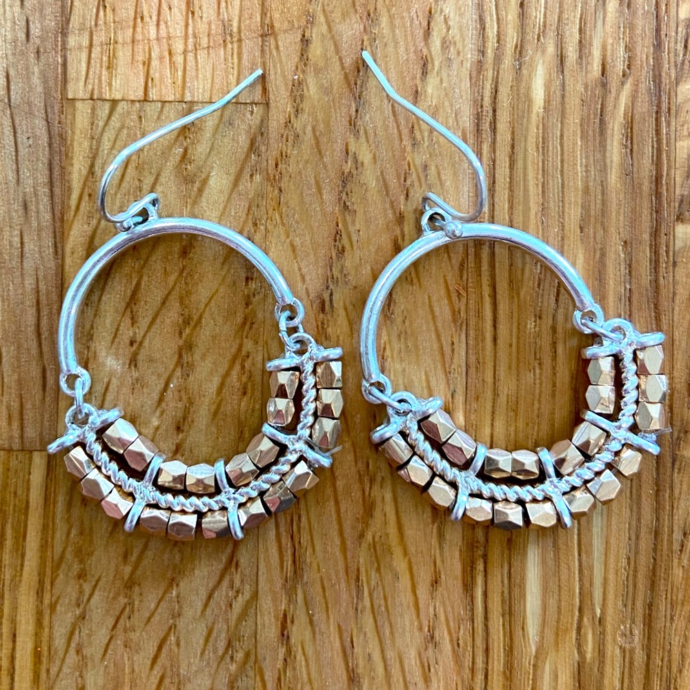 Two-tone earrings.